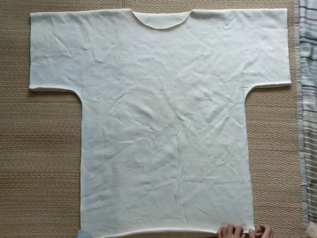 the t-shirt after cutting out the pattern shape