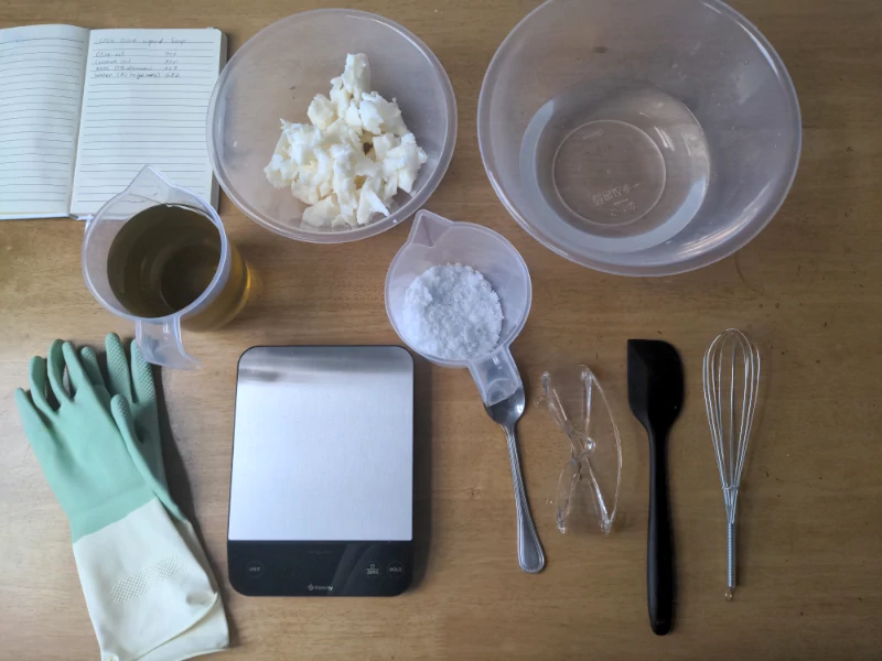 cold-process soap workstation with tools and materials prepared