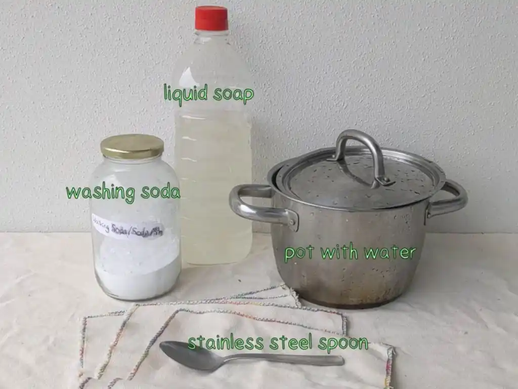 Tools needed for scouring fabric, liquid soap, washing soda, stainless steel spoom, pot with water